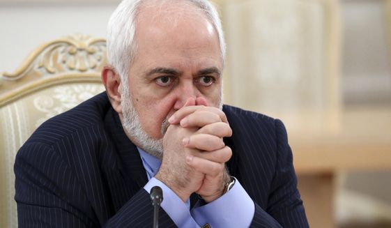FILE - In this Jan. 26, 2021, file photo released by the Russian Foreign Ministry Press Service, Iranian Foreign Minister Mohammad Javad Zarif listens during the talks in Moscow, Russia. Iran&#39;s foreign minister apologized Sunday for recorded comments that were leaked to the public last week, creating a firestorm in Iran less than two months before presidential elections.(Russian Foreign Ministry Press Service via AP, File)