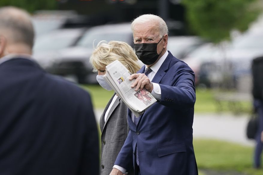 President Joe Biden and first lady Jill Biden arrive to board Marine One on the Ellipse near the White House, Monday, May 3, 2021, in Washington. The Bidens are en route to Virginia. (AP Photo/Patrick Semansky)