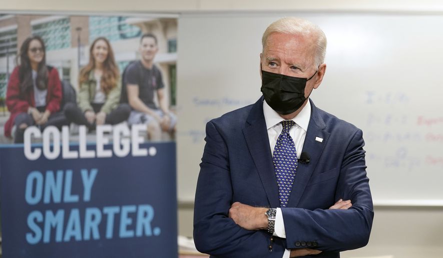 President Joe Biden tours an HVAC workshop at Tidewater Community College, Monday, May 3, 2021, in Portsmouth, Va. (AP Photo/Evan Vucci)