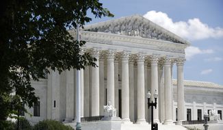 In this June 29, 2020, file photo, the Supreme Court is seen on Capitol Hill in Washington. (AP Photo/Patrick Semansky) ** FILE **