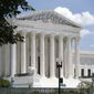 In this June 29, 2020, file photo, the Supreme Court is seen on Capitol Hill in Washington. (AP Photo/Patrick Semansky) ** FILE **