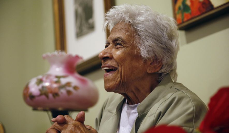 FILE - In this Wednesday, Dec. 30, 2015 file photo, Leah Chase speaks during an interview at her family&#x27;s restaurant, Dooky Chase&#x27;s, in New Orleans. The restaurant, which served as a safe meeting space for civil rights activists to strategize, is the site of the first marker to go up on the Louisiana Civil Rights Trail on Monday, May 3, 2021. Chase died in 2019 but her family still owns and operates the restaurant, whose walls are graced by an extensive collection of works by African American artists.  (AP Photo/Gerald Herbert)