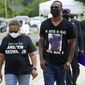People arrive for the funeral for Andrew Brown Jr., Monday, May 3, 2021 at Fountain of Life Church in Elizabeth City, N.C. Brown was fatally shot by Pasquotank County Sheriff deputies trying to serve a search warrant. (AP Photo/Gerry Broome)