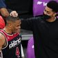 Washington Wizards guard Russell Westbrook (4) talks with Indiana Pacers&#39; Jeremy Lamb, right, after a basketball game, Monday, May 3, 2021, in Washington. The Wizards won 154-141. (AP Photo/Alex Brandon)