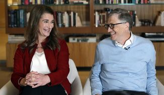 FILE - In this Feb. 1, 2019, file photo, Bill and Melinda Gates smile at each other during an interview in Kirkland, Wash. The couple announced Monday, May 3, 2021, that they are divorcing. The Microsoft co-founder and his wife, with whom he launched the world&#39;s largest charitable foundation, said they would continue to work together at The Bill &amp;amp; Melinda Gates Foundation. (AP Photo/Elaine Thompson, File)
