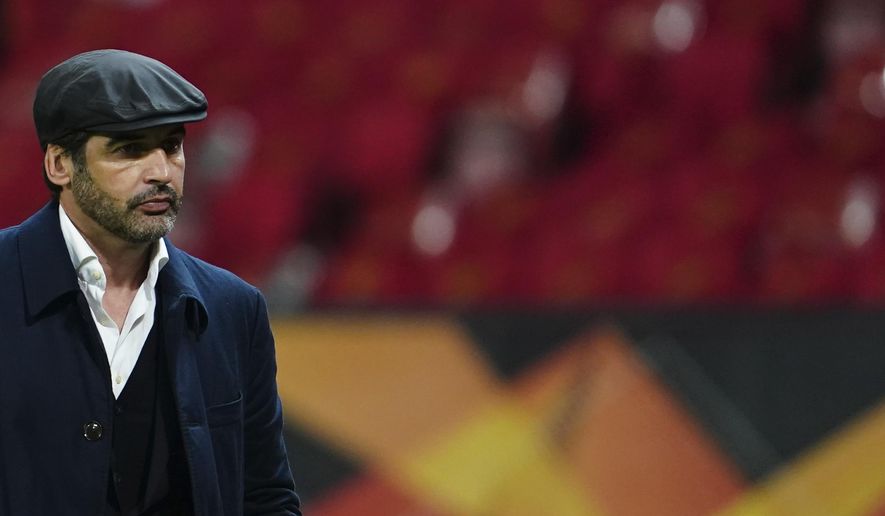 Roma&#39;s head coach Paulo Fonseca leaves the pitch at the end of the Europa League semi final, first leg soccer match between Manchester United and Roma at Old Trafford in Manchester, England, Thursday, April 29, 2021. (AP Photo/Jon Super)