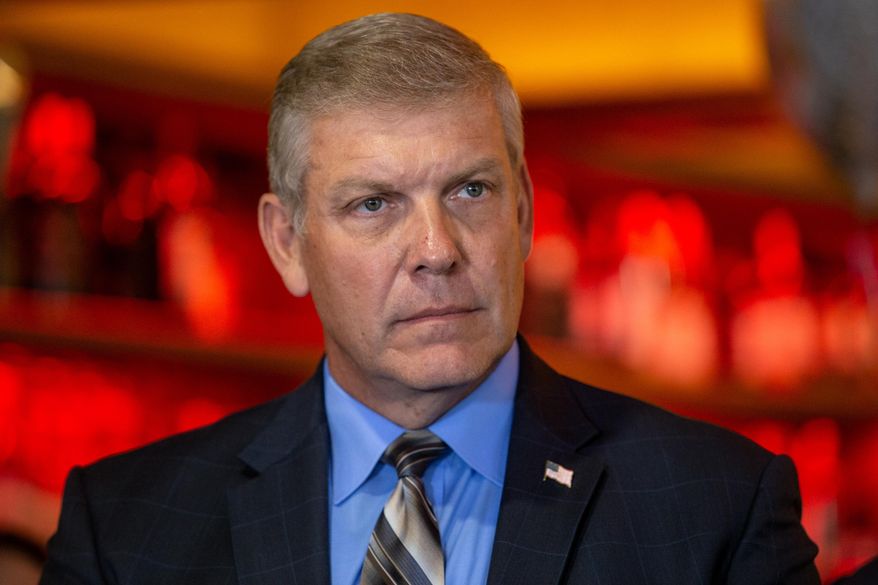 Rep. Barry Loudermilk, R-Georgia, listens to a speaker at a press conference held at a diner on Monday, May 4, 2021, in Marietta, Ga. (AP Photo/Ron Harris) ** FILE **