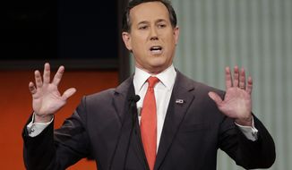 FILE - Republican presidential candidate, former Pennsylvania Sen. Rick Santorum speaks during the Fox Business Network Republican presidential debate in North Charleston, S.C. on Jan. 14, 2016. The CNN analyst went on the network to try and explain comments about Native Americans that have led to criticism, but didn&#39;t appear to calm things down. Santorum told a group of young conservative last month that there was ‘nothing here’ when immigrants founded the United States. That angered Native Americans and others. He said on CNN Monday that he was speaking in context of the U.S. government&#39;s creation and didn&#39;t mean to minimize treatment of Native Americans. (AP Photo/Chuck Burton, File)