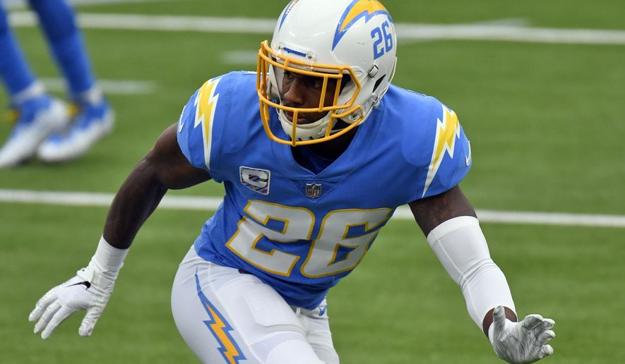 FILE - In this Oct. 25, 2020, file photo, Los Angeles Chargers cornerback Casey Hayward watches the play during the first half of an NFL football game against the Jacksonville Jaguars in Inglewood, Calif. The Las Vegas Raiders signed free agent cornerback Casey Hayward to a one-year deal, adding needed experience to a young secondary that has struggled in recent years. The deal announced Tuesday May 4, 2021 reunites Hayward with defensive coordinator Gus Bradley.. (AP Photo/Kyusung Gong, File)