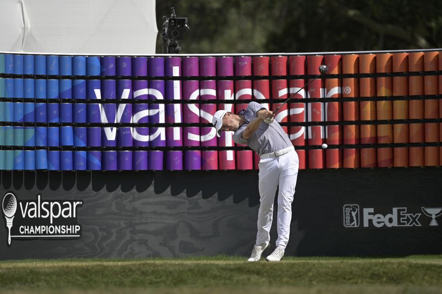Justin Thomas tees off on the 18th hole during the final round of the Valspar Championship golf tournament, Sunday, May 2, 2021, in Palm Harbor, Fla. (AP Photo/Phelan M. Ebenhack)