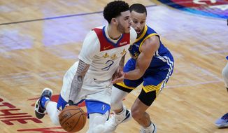 New Orleans Pelicans guard Lonzo Ball (2) drives past Golden State Warriors guard Stephen Curry in the second half of an NBA basketball game in New Orleans, Tuesday, May 4, 2021. The Pelicans won 108-103. (AP Photo/Gerald Herbert)