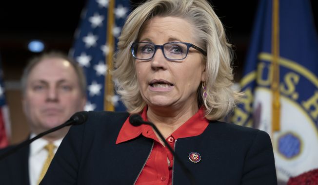 In this Feb. 13, 2019, photo, House Republican Conference chair Rep. Liz Cheney, R-Wyo., with House Minority Whip Steve Scalise, R-La., at right, talks to reporters during a news conference at the Capitol in Washington. (AP Photo/J. Scott Applewhite) **FILE**
