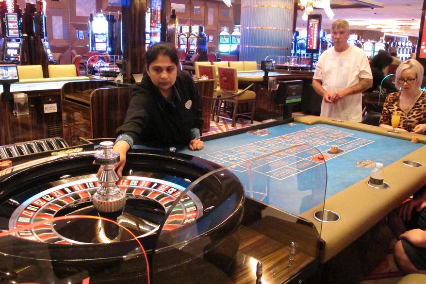 In this June 20, 2019 photo, a game of roulette is underway at the Hard Rock casino in Atlantic City, N.J. A report released Wednesday, May 5, 2021, from a state panel recommended rebuilding Atlantic City&#39;s Boardwalk, improving the look of its business districts, and embracing the &amp;quot;blue economy&amp;quot; of the ocean to help the seaside gambling resort recover from the COVID-19 pandemic. It also suggested money from legalized marijuana sales could help pay for it.  (AP Photo/Wayne Parry)