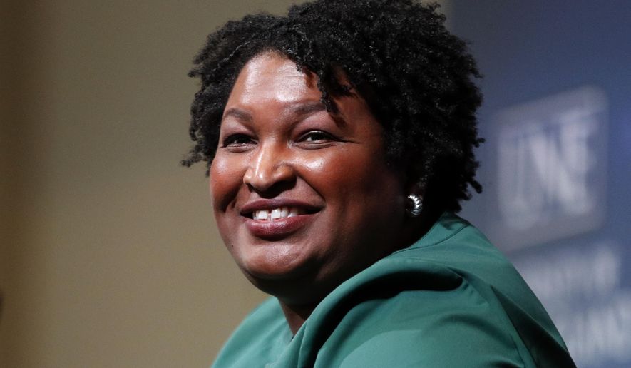 Stacey Abrams, a Georgia Democrat who has launched a multimillion-dollar effort to combat voter suppression, speaks at the University of New England in Portland, Maine on Jan. 22, 2020.  Stacey Abrams announced Wednesday she is running for governor of Georgia, delighting Democrats, liberals activists and setting the stage for one of the most high-profile gubernatorial races in the country. (AP Photo/Robert F. Bukaty, File)