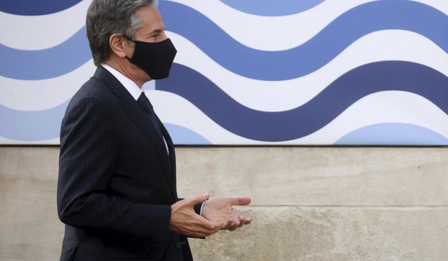 US Secretary of State, Antony Blinken, arrives for talks, during the G7 foreign ministers' meeting, at Lancaster House in London, Wednesday, May 5, 2021. Diplomats from the group of wealthy nations are meeting in London for their first face-to-face gathering in two years. (Hannah McKay/Pool Photo via AP)
