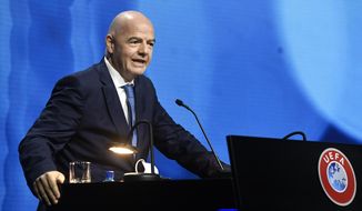 FIFA President Gianni Infantino speaks during the 45th UEFA Congress in Montreux, Switzerland, Tuesday April 20, 2021. In a speech that seemed to blame the club owners and absolve players, FIFA president Gianni Infantino said he can only &amp;quot;strongly disapprove&amp;quot; of the Super League. &amp;quot;If some elect to go their own way, then they must live with the consequences of their choice,&amp;quot; Infantino said. &amp;quot;They are responsible for their choice.&amp;quot; (Richard Juilliart/UEFA via AP)