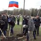 Russians and Americans plant &quot;Friendship&quot; tree in the &quot;Victory Park&quot; on Poklonnaya Gora in Moscow on April 25, 2021.