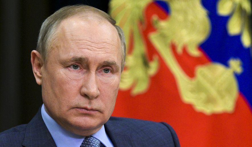 Russian President Vladimir Putin attends a meeting with Deputy Prime Minister Tatyana Golikova via video conference at the Bocharov Ruchei residence in the Black Sea resort of Sochi, Russia, Thursday, May 6, 2021. (Alexei Druzhinin, Sputnik, Kremlin Pool Photo via AP)