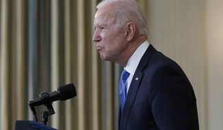 President Joe Biden takes questions from reporters as he speaks about the American Rescue Plan, in the State Dining Room of the White House, Wednesday, May 5, 2021, in Washington. (AP Photo/Evan Vucci)