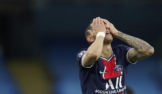 PSG&#39;s Angel Di Maria gesture after missing a chance during the Champions League semifinal second leg soccer match between Manchester City and Paris Saint Germain at the Etihad stadium, in Manchester, Tuesday, May 4, 2021. (AP Photo/Dave Thompson)