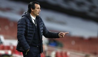 Villareal&#39;s manager Unai Emery gives instructions from the side line during the Europa League semifinal second leg soccer match between Arsenal and Villarreal at the Emirates stadium in London, England, Thursday, May 6, 2021. (AP Photo/Alastair Grant)