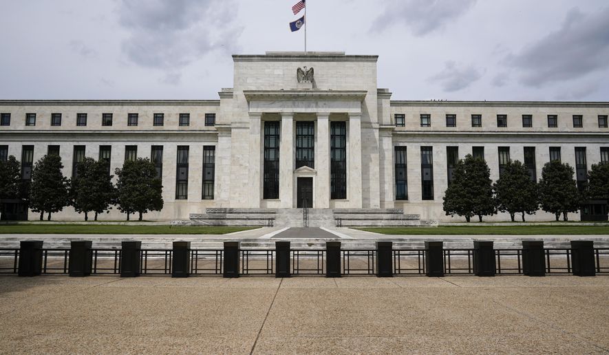 In this May 4, 2021, file photo is the Federal Reserve in Washington. (AP Photo/Patrick Semansky, File)