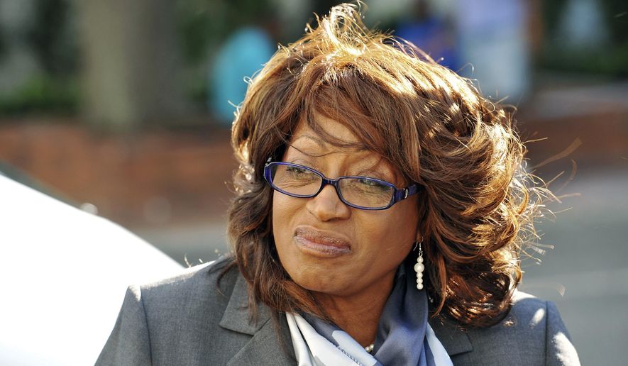 Former U.S. Rep. Corrine Brown walks to the federal courthouse in Jacksonville, Fla. (Bob Self/The Florida Times-Union via AP, File)