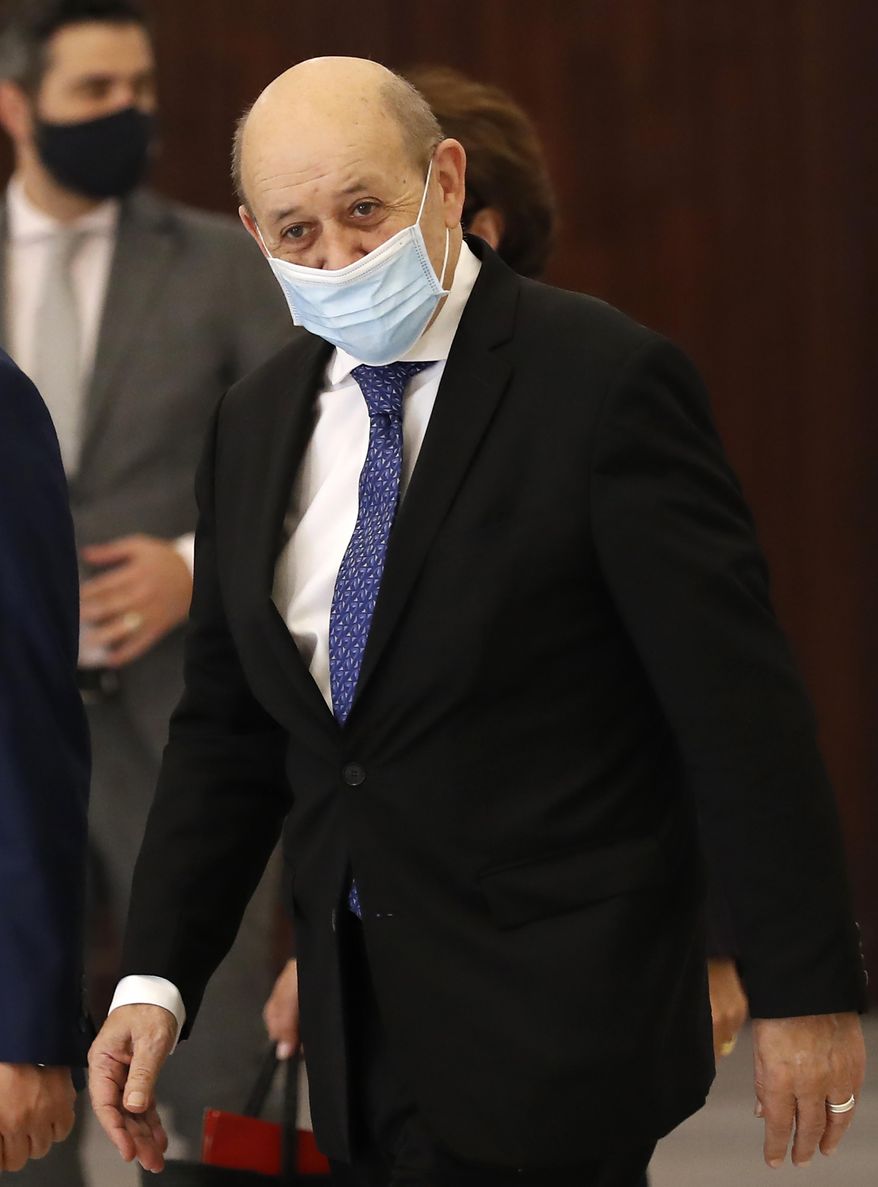 French Foreign Minister Jean-Yves Le Drian, leaves the Presidential Palace after his meeting with Lebanese President Michel Aoun in Baabda, east of Beirut, Lebanon, Thursday, May 6, 2021. (AP Photo/Hussein Malla) ** FILE **