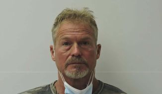 This photo provided by Chaffee County Sheriff’s Office shows Barry Morphew.  Morphew was arrested in connection with the disappearance of his wife, Suzanne Morphew, as the result of an ongoing investigation that has so far involved over 135 searches across Colorado and the interviews of over 400 people in multiple states, Chaffee County Sheriff John Spezze said, Wednesday, May 5, 2021.    (Chaffee County Sheriff’s Office via AP)
