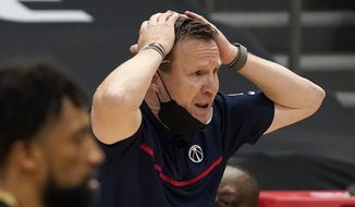 Washington Wizards head coach Scott Brooks reacts to an official&#39;s call during the second half of an NBA basketball game against the Toronto Raptors Thursday, May 6, 2021, in Tampa, Fla. (AP Photo/Chris O&#39;Meara)