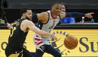 Washington Wizards guard Russell Westbrook (4) steals the ball from Toronto Raptors guard Fred VanVleet (23) during the first half of an NBA basketball game Thursday, May 6, 2021, in Tampa, Fla. (AP Photo/Chris O&#39;Meara)