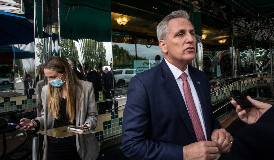 In this May 4, 2021, photo, House Minority Leader Kevin McCarthy, of Calif., speaks to a reporter outside a diner in Marietta, Ga. McCarthy and other Republicans decried Major League Baseball&#39;s decision to move the All-Star game out of Georgia amid concerns about changes to the state&#39;s voting laws. McCarthy is leading his party to an inflection point. House Republicans are preparing to dump Rep. Liz Cheney from the No. 3 leadership position. If so, McCarthy will have transformed what’s left of the party of Lincoln more decisively into the party of Trump. (AP Photo/Ron Harris, File)