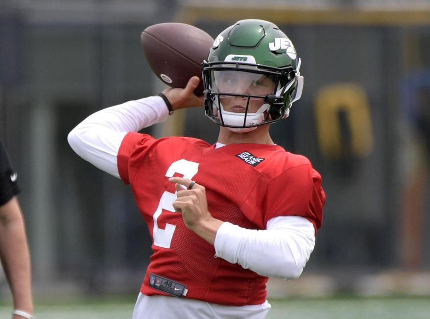New York Jets first-round draft pick Zach Wilson works out during NFL football rookie camp, Friday, May 7, 2021, in Florham Park, N.J. (AP Photo/Bill Kostroun)
