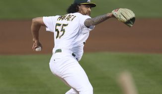 Oakland Athletics&#39; Sean Manaea throws to a Tampa Bay Rays batter during the fifth inning of a baseball game in Oakland, Calif., Friday, May 7, 2021. (AP Photo/Jed Jacobsohn)
