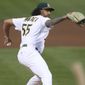 Oakland Athletics&#39; Sean Manaea throws to a Tampa Bay Rays batter during the fifth inning of a baseball game in Oakland, Calif., Friday, May 7, 2021. (AP Photo/Jed Jacobsohn)