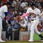 Houston Astros&#39; Kyle Tucker (30) celebrates his three-run home run with Yuli Gurriel during the fourth inning of a baseball game against the Toronto Blue Jays, Sunday, May 9, 2021, in Houston. (AP Photo/Eric Christian Smith)