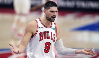Chicago Bulls center Nikola Vucevic reacts after a foul during the second half of an NBA basketball game against the Detroit Pistons, Sunday, May 9, 2021, in Detroit. (AP Photo/Carlos Osorio)