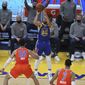 Golden State Warriors&#39; Stephen Curry, center, shoots a 3-pointer against Oklahoma City Thunder&#39;s Isaiah Roby during the first half of an NBA basketball game in San Francisco, Saturday, May 8, 2021. (AP Photo/Jed Jacobsohn)