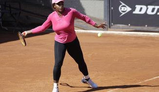 Serena Williams returns the ball during a training session at the Italian Open tennis tournament, in Rome, Monday, May 10, 2021. (AP Photo/Gregorio Borgia)