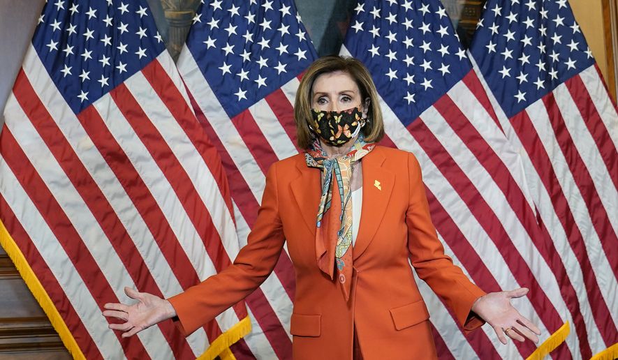 House Speaker Nancy Pelosi of Calif., arrives for a photo opportunity on Capitol Hill in Washington, Tuesday, May 11, 2021. (AP Photo/Susan Walsh)