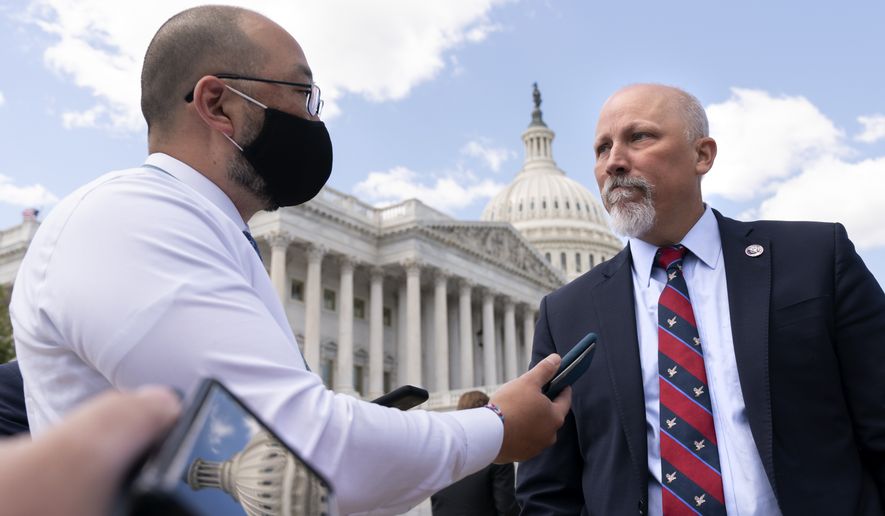 Rep. Chip Roy, R-Texas, right, speaks with reporters after a news conference, Wednesday, May 12, 2021, on Capitol Hill in Washington. (AP Photo/Jacquelyn Martin)