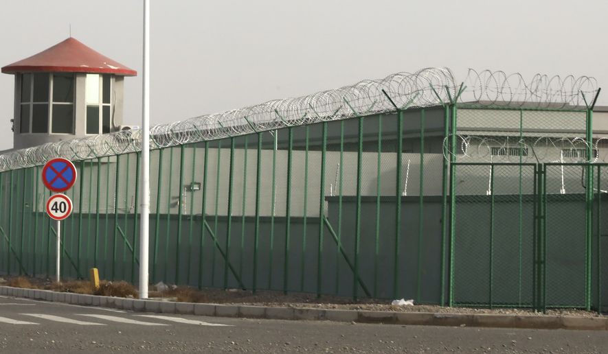 The State Department says China is abusing an estimated 200 million religious believers, many held at internment facilities in its Xinjiang region. (Associated Press)