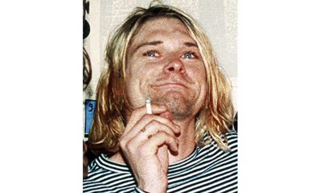 This 1993 file photo shows Kurt Cobain, the lead singer of the U.S. rock band Nirvana. (AP Photo/Mark J. Terrill, File)