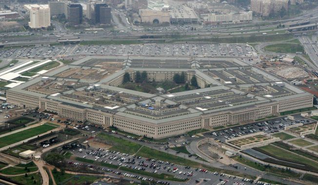 This March 27, 2008, file photo, shows the Pentagon in Washington. Reports of sexual assaults across the U.S. military increased by a very small amount in 2020, a year when troops were largely locked down for months as bases around the world grappled with the COVID-19 pandemic, according to U.S. officials. (AP Photo/Charles Dharapak, File)
