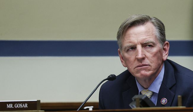 Rep. Paul Gosar, R-Ariz., listens during a House Oversight and Reform Committee regarding the on Jan. 6 attack on the U.S. Capitol, on Capitol Hill in Washington, Wednesday, May 12, 2021. (Jonathan Ernst/Pool via AP/File)