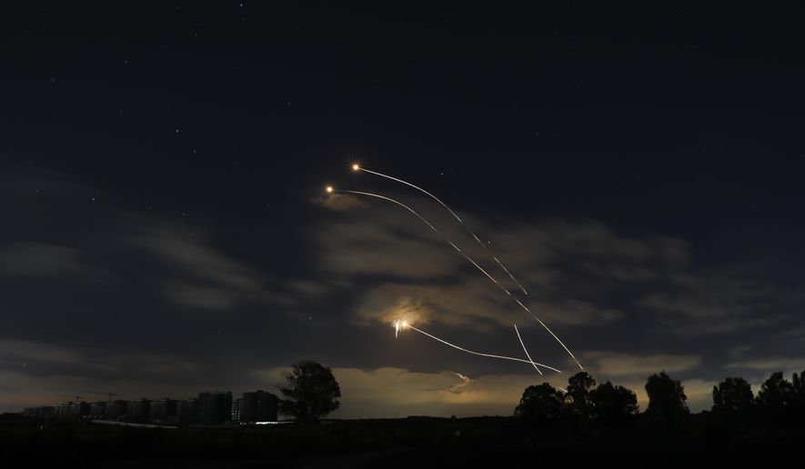 Israeli Iron Dome air defense system launches to intercept rockets fired from Gaza Strip, near Sderot, Israel, Thursday, May 13, 2021. (AP Photo/Ariel Schalit) ** FILE **
