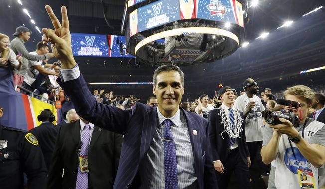 Villanova head coach Jay Wright celebrates after the NCAA Final Four tournament college basketball championship game against North Carolina, Monday, April 4, 2016, in Houston. Wright is among those announced Sunday, May 16, 2021 as the 2021 class for the Naismith Memorial Basketball Hall of Fame. (AP Photo/David J. Phillip, file) **FILE**