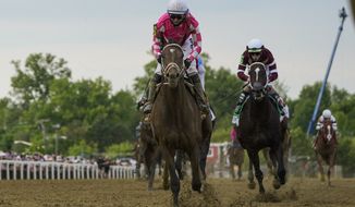 Flavien Prat atop Rombauer wins the 146th Preakness Stakes horse race at Pimlico Race Course, Saturday, May 15, 2021, in Baltimore. (AP Photo/Julio Cortez) **FILE**