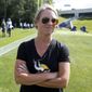 Kelly Kleine, the  Minnesota Vikings coordinator of college scouting, poses during NFL football practice in Eden Prairie, Minn., in this Sept. 5, 2017, file photo. The Denver Broncos have hired Kelly Kleine as executive director of football operations and special advisor to the general manager, Monday, May 17, 2021.  (AP Photo/Jim Mone, File) **FILE**