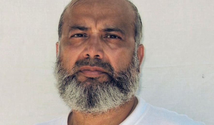This undated photo made by the International Committee of the Red Cross and provided by lawyer David H. Remes, shows Guantanamo prisoner Saifullah Paracha. A lawyer for the oldest prisoner at the U.S. base at Guantanamo Bay, Cuba, says authorities have approved his release after more than 16 years in custody. Attorney Shelby-Sullivan Bennis says she was notified Monday that the prison review board determined 73-year-old Saifullah Paracha is deemed to no longer pose a threat to U.S. security. The native of Pakistan has been held at Guantanamo since September 2004 for suspected links to al-Qaida but was never charged.  (Provided by David H. Remes via AP)